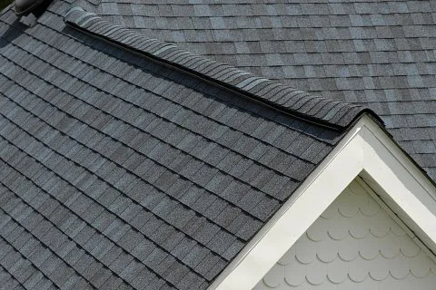 CertainTeed Landmark PRO shingles in Cobalt Blue showing ridge cap detail on a residential roof