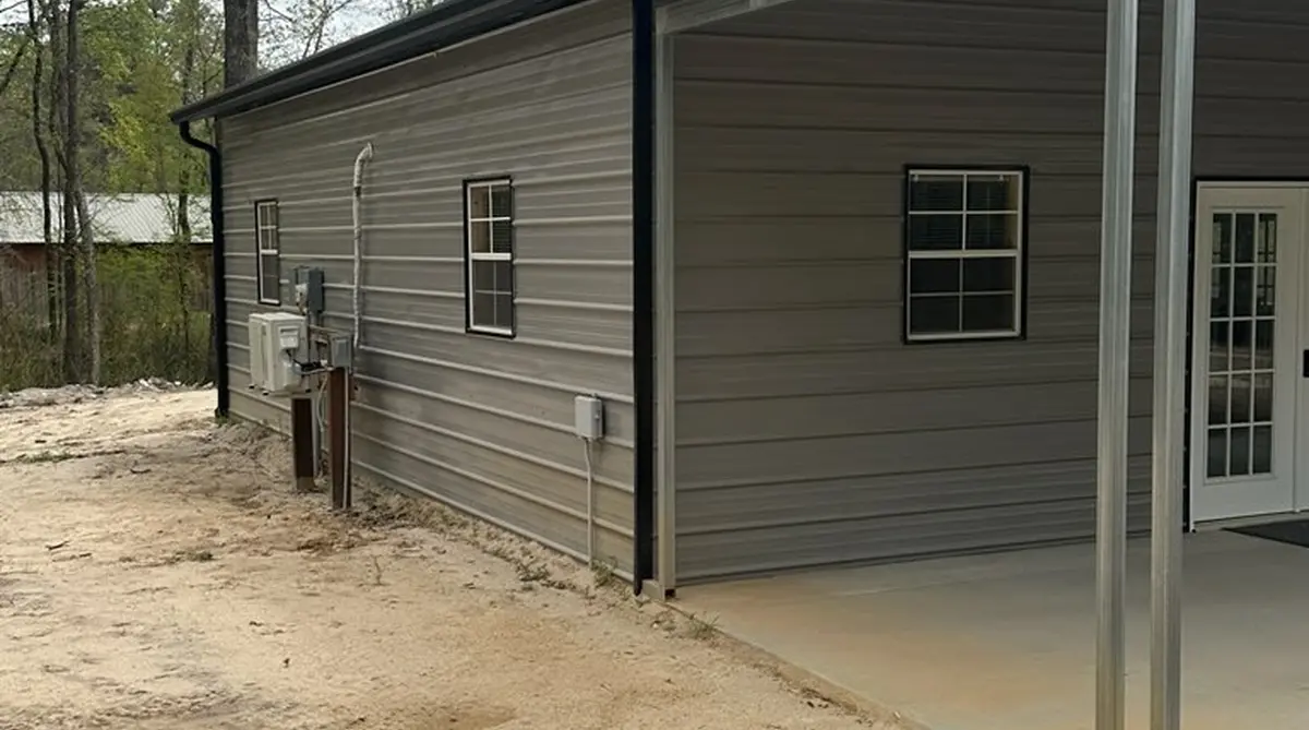 Completed commercial metal building with seamless gutter installation in Branchville SC