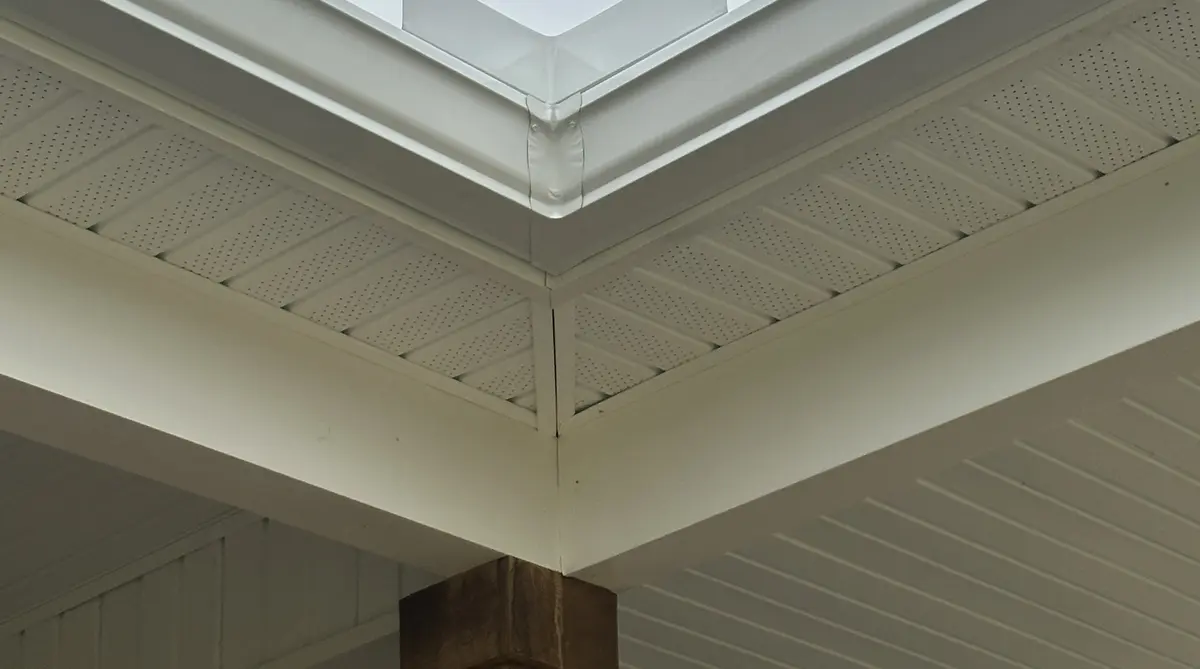 Seamless gutter corner detail showing precision miter joint on residential home in Rowesville SC